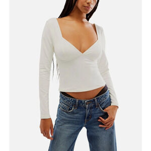 FREE PEOPLE TOP WOMENS SIZE LARGE DUO CORSET LONG SLEEVE STRETCH TEE IVORY
